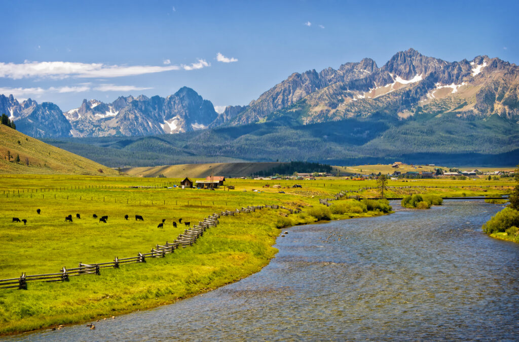 River of No Return, with ranch and mountains in the background. Insurance does not have to be scary.